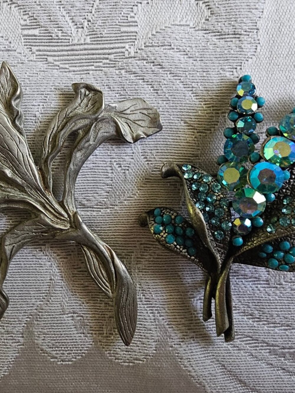 Two Pewter Brooches